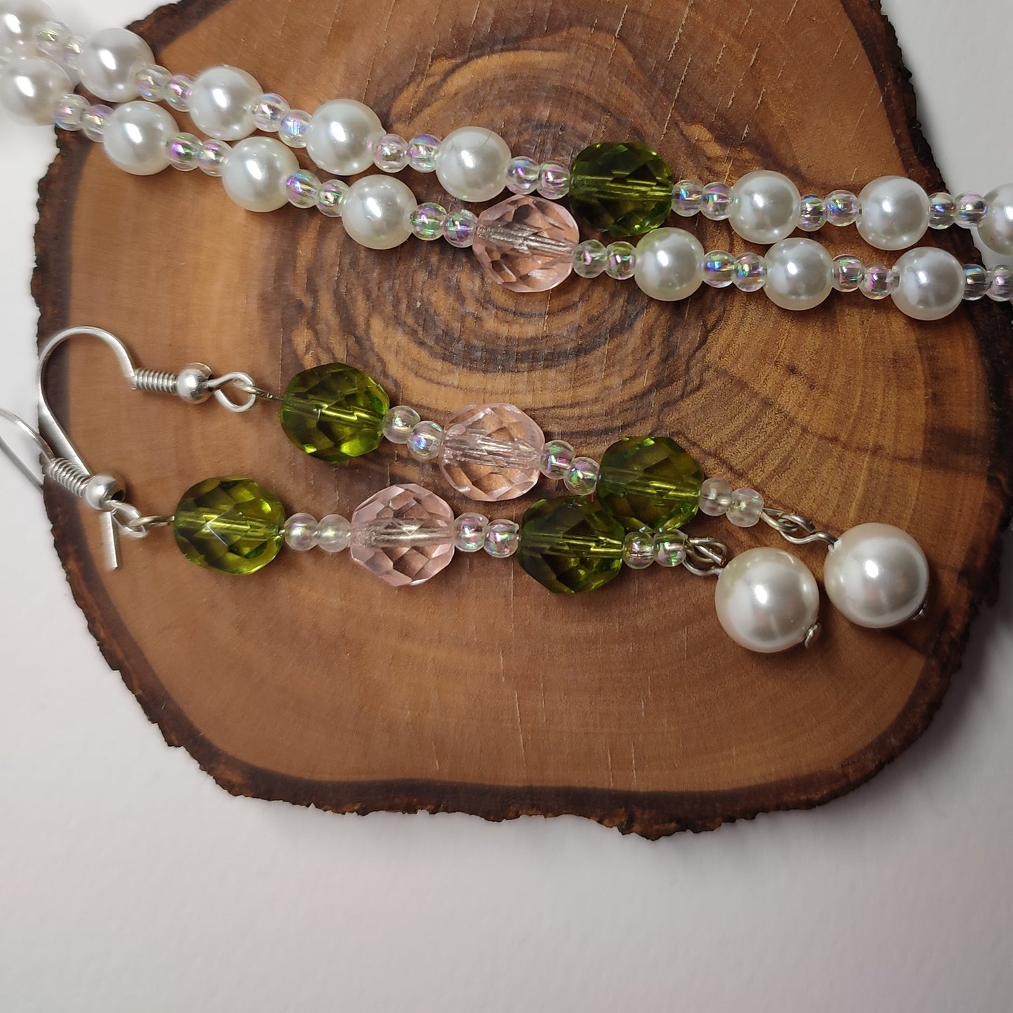 Long wire pearl earrings with green and pink colored beads