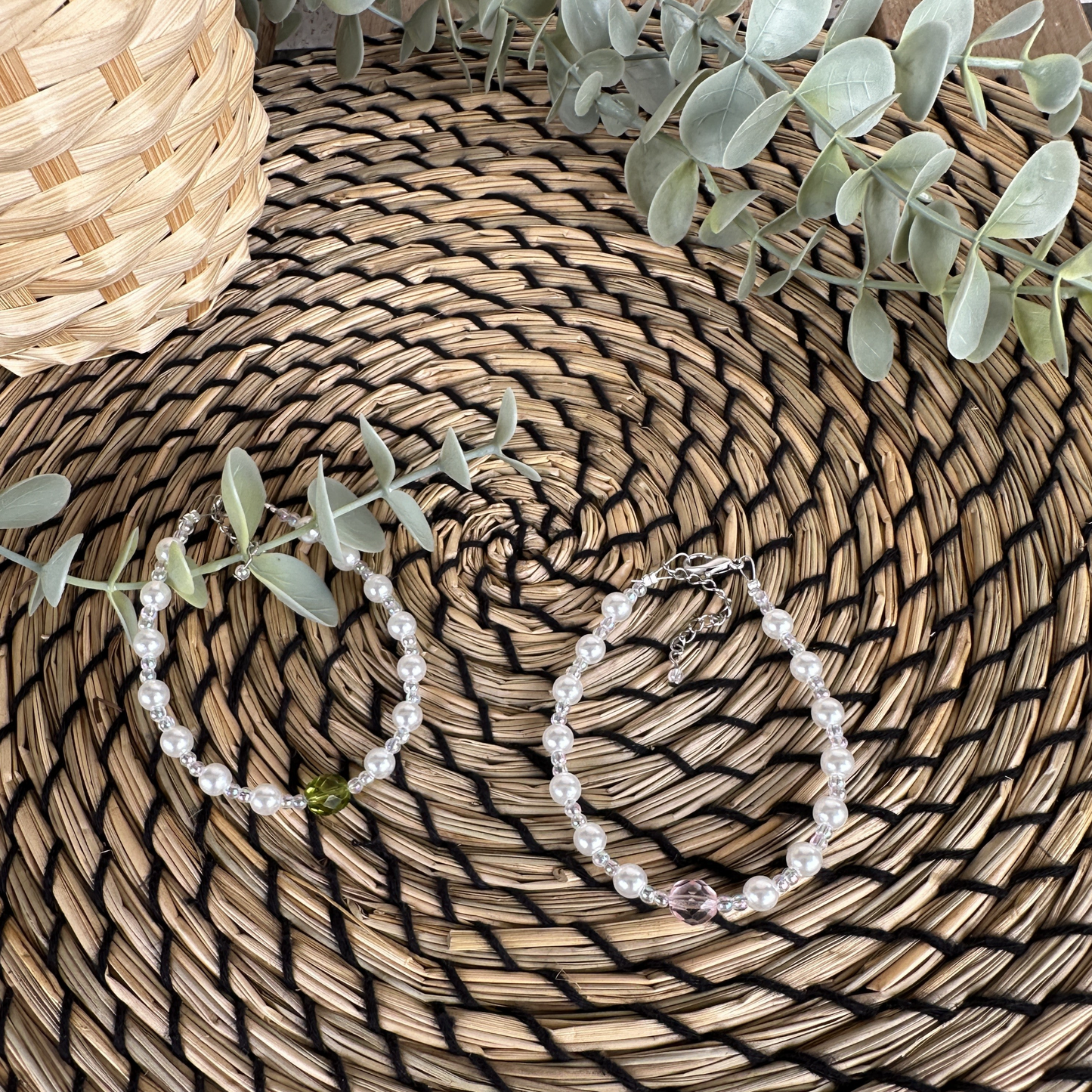 White faux bead bracelet with a series of lustrous faux pearl-like beads