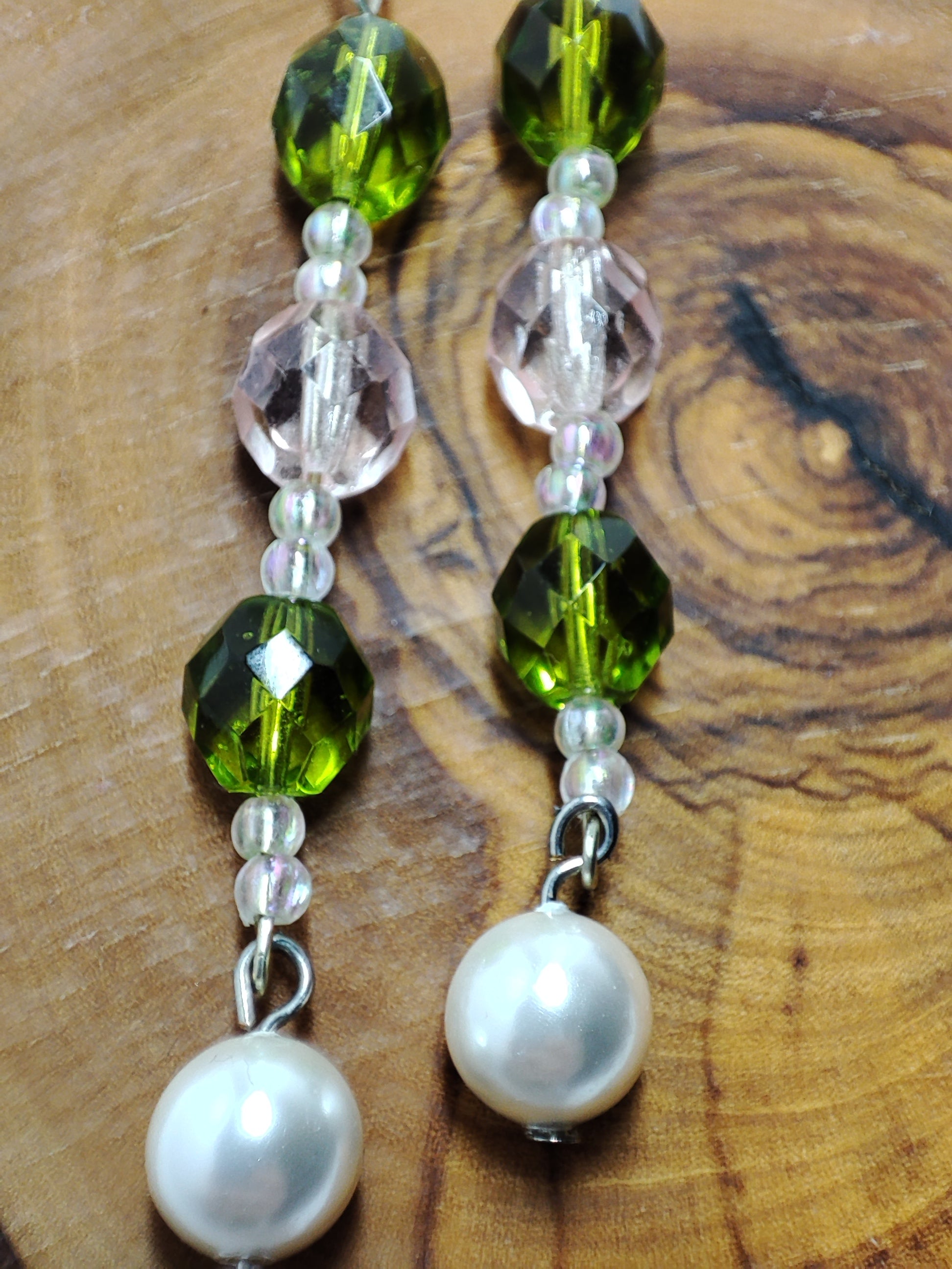 Long wire pearl earrings with green and pink colored beads