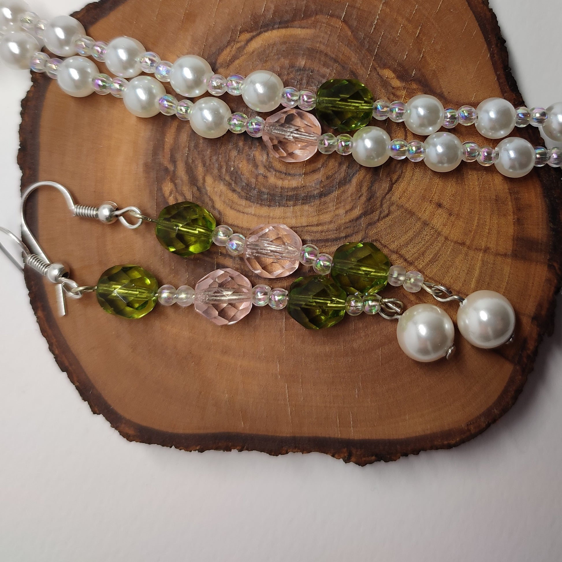 Long wire pearl earrings with green and pink colored beads