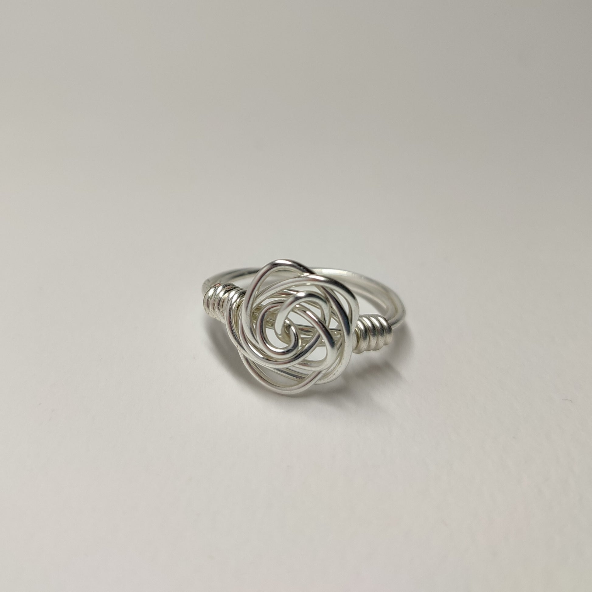 wire ring with rose formation