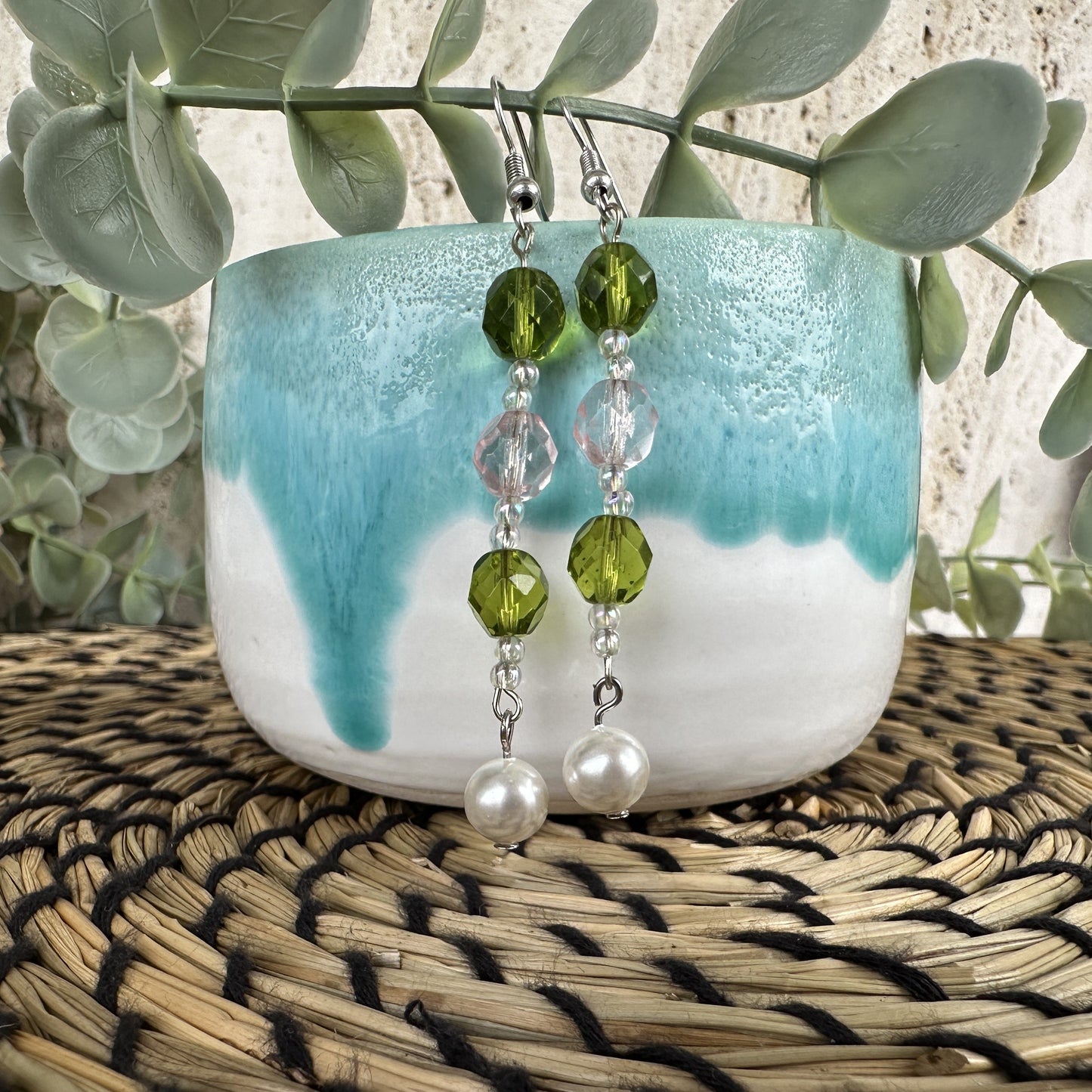 Long wire pearl earrings with green and pink colored beads